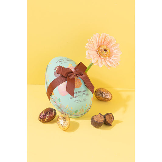 egg tin filled with 12 assorted praline chocolate eggs 144g