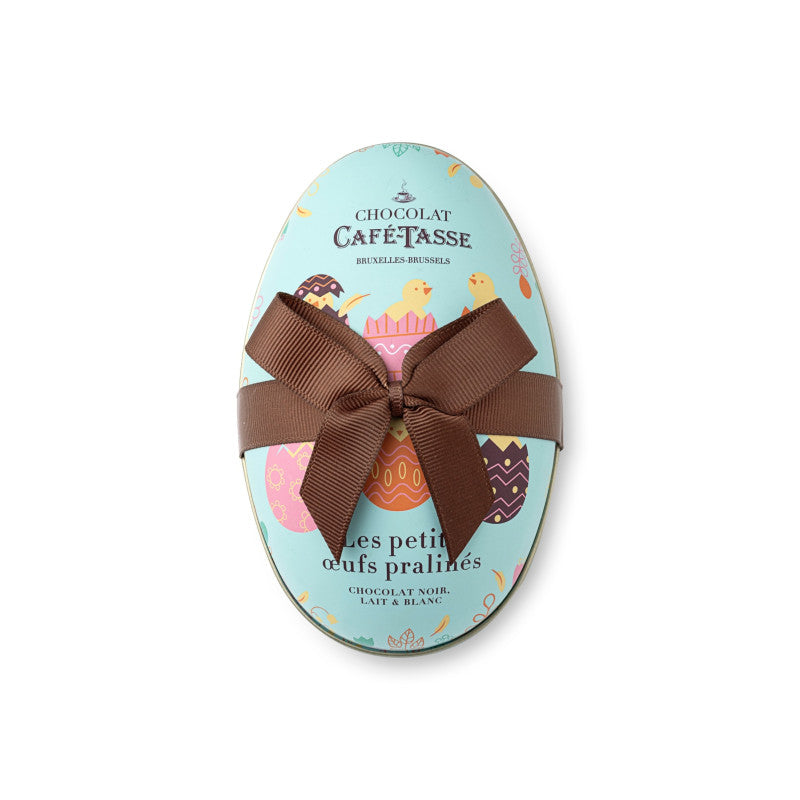 egg tin filled with 12 assorted praline chocolate eggs 144g